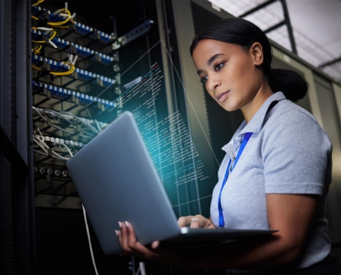 Person Using Computer In Data Center