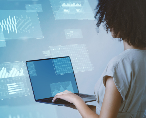 Data Analyst Typing On Laptop