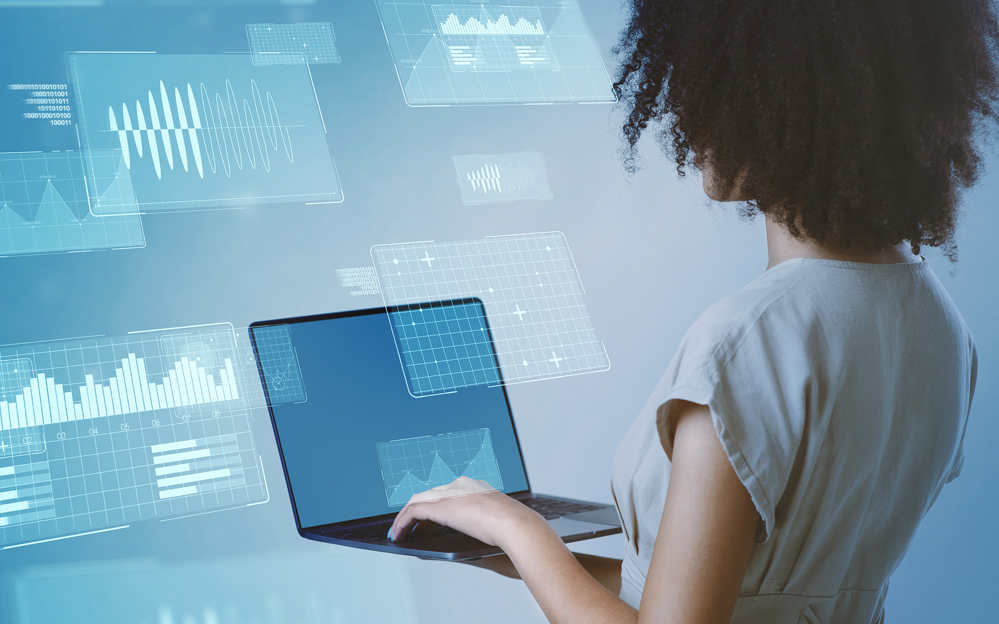 Data Analyst Typing On Laptop