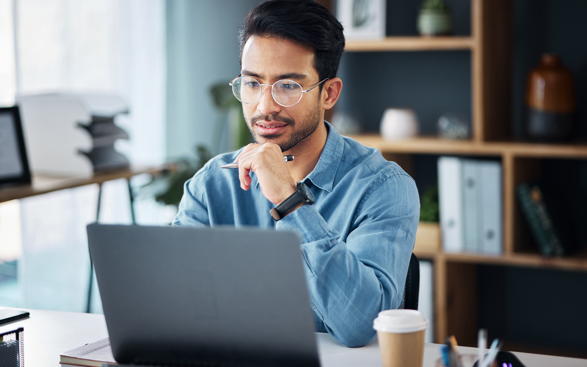 Business Man Thinking At Laptop In Office For Startup Management