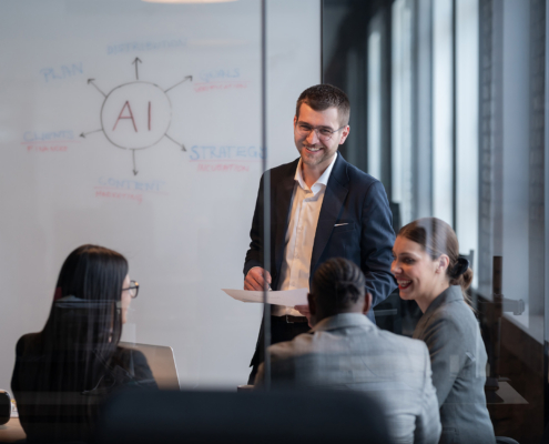 Diverse Business Team In A Modern Office During A Meeting, Discussing Artificial Intelligence Strategy